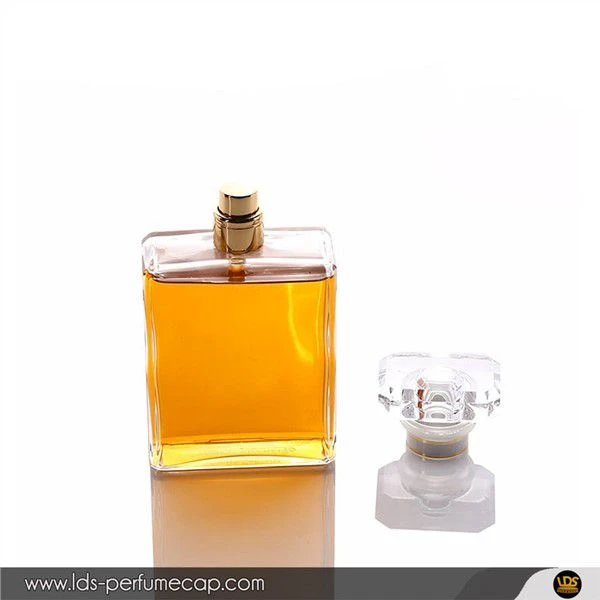 Care este sigiliul fix dintre sticla de parfum și capul de pulverizare?